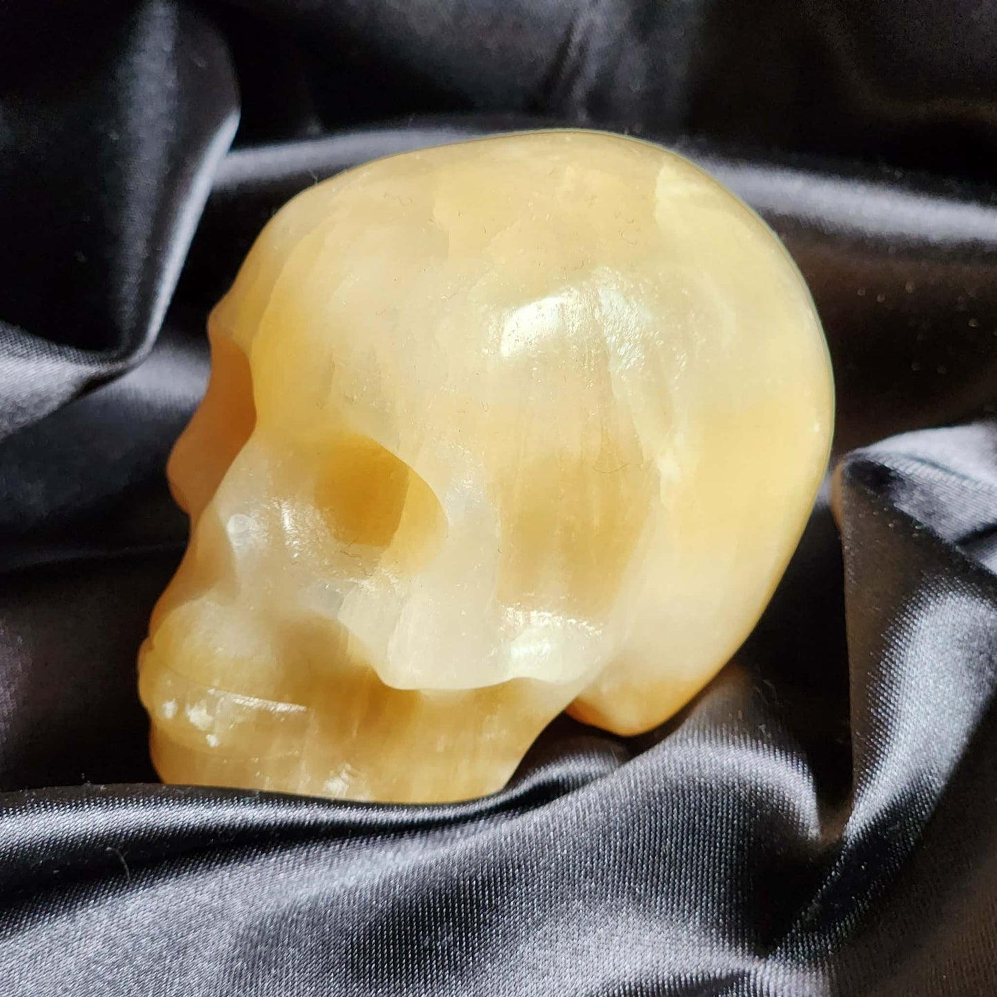 Orange Calcite Skulls