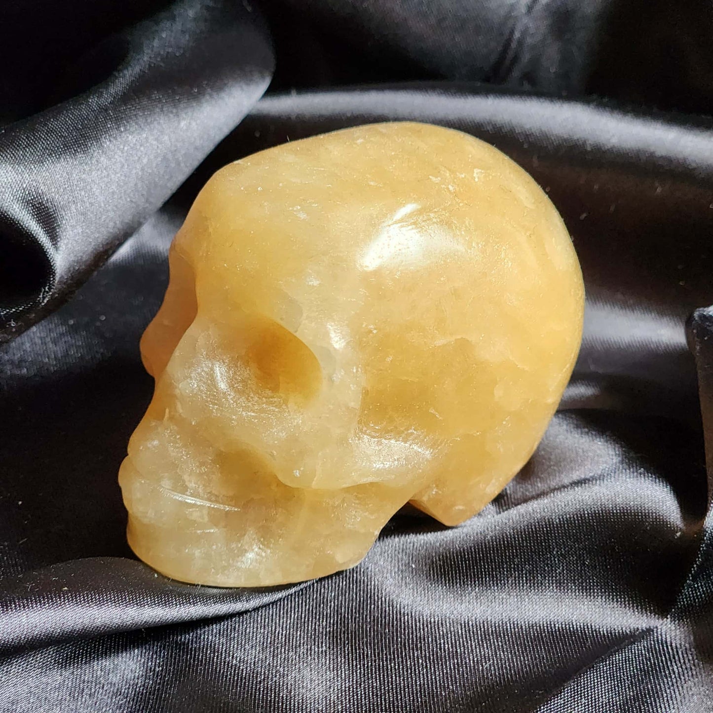 Orange Calcite Skulls